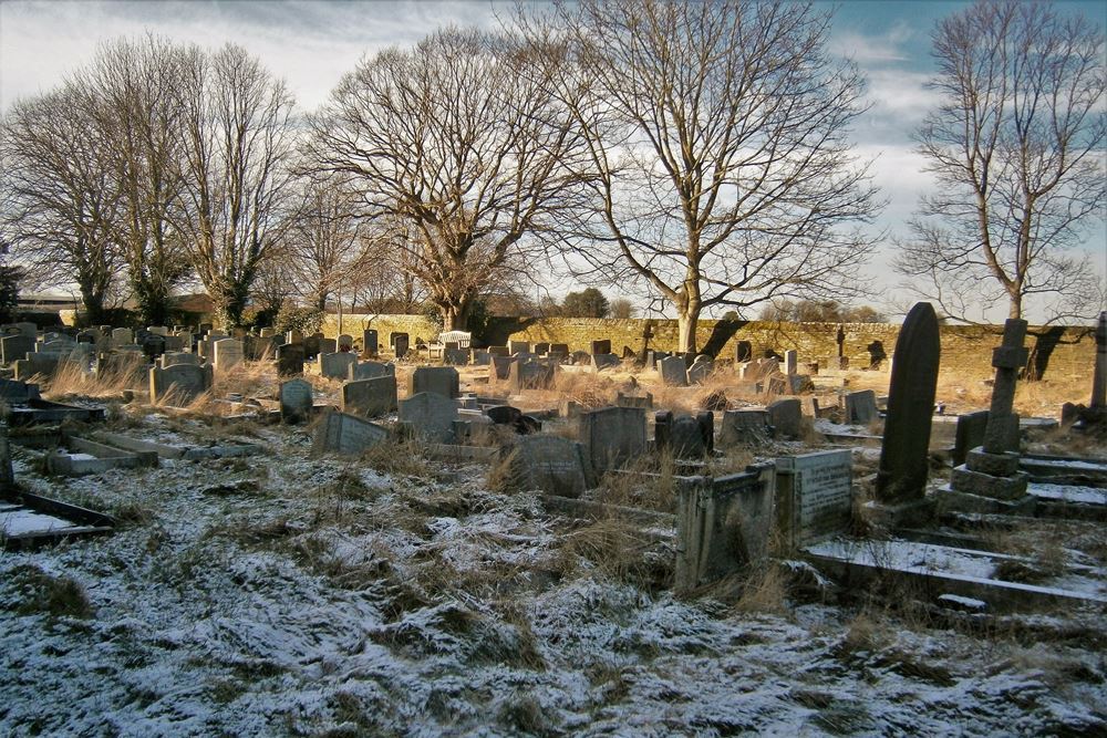 Oorlogsgraf van het Gemenebest St. John Churchyard